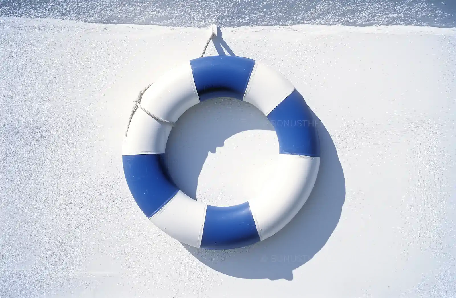Blue and White Life Preserver Hanging on Wall | Nautical AI Image