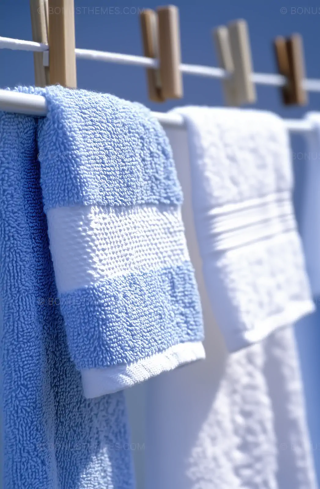Blue and White Towels Hanging on Clothesline | Fresh & Calm AI Image