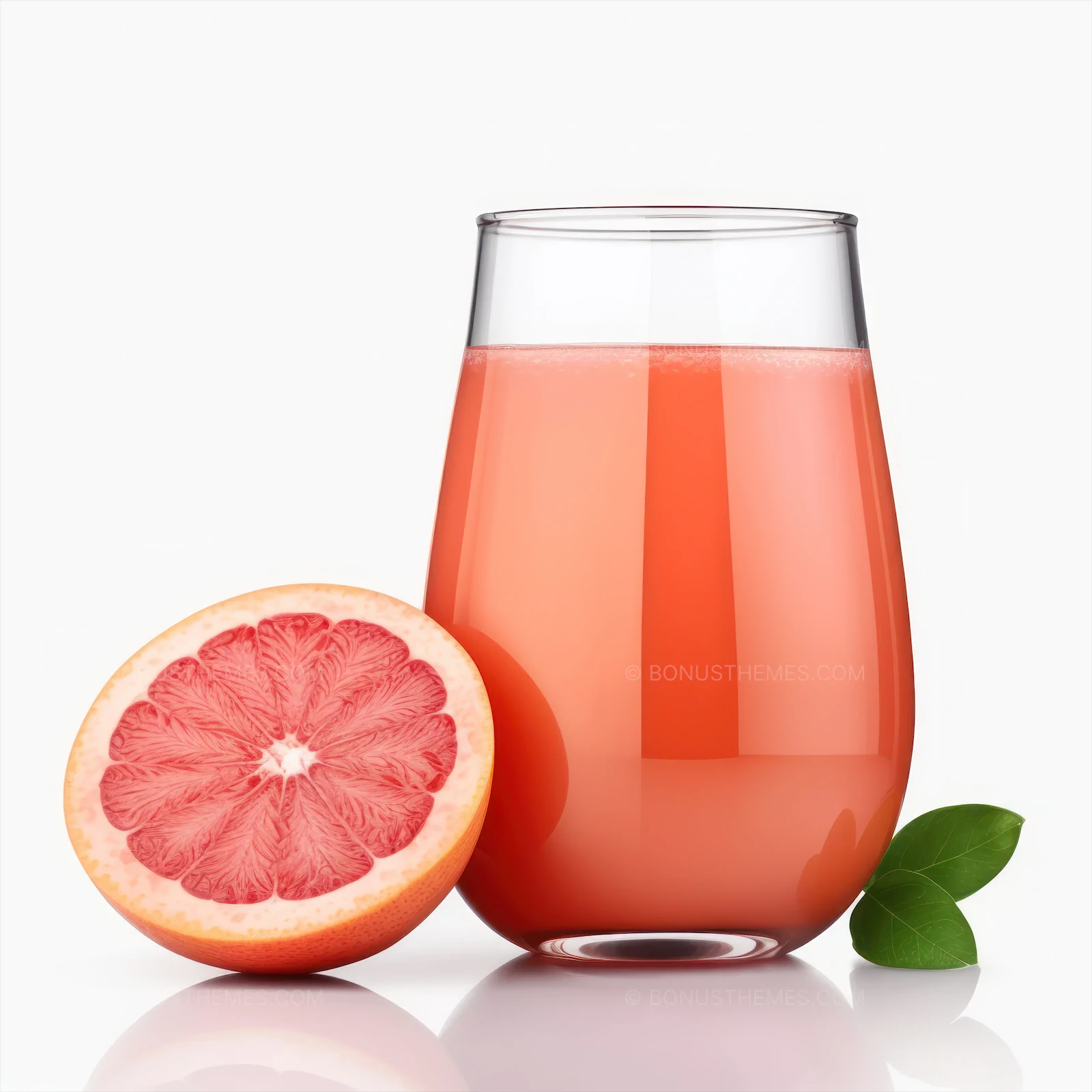 Grapefruit and juice on isolated white background