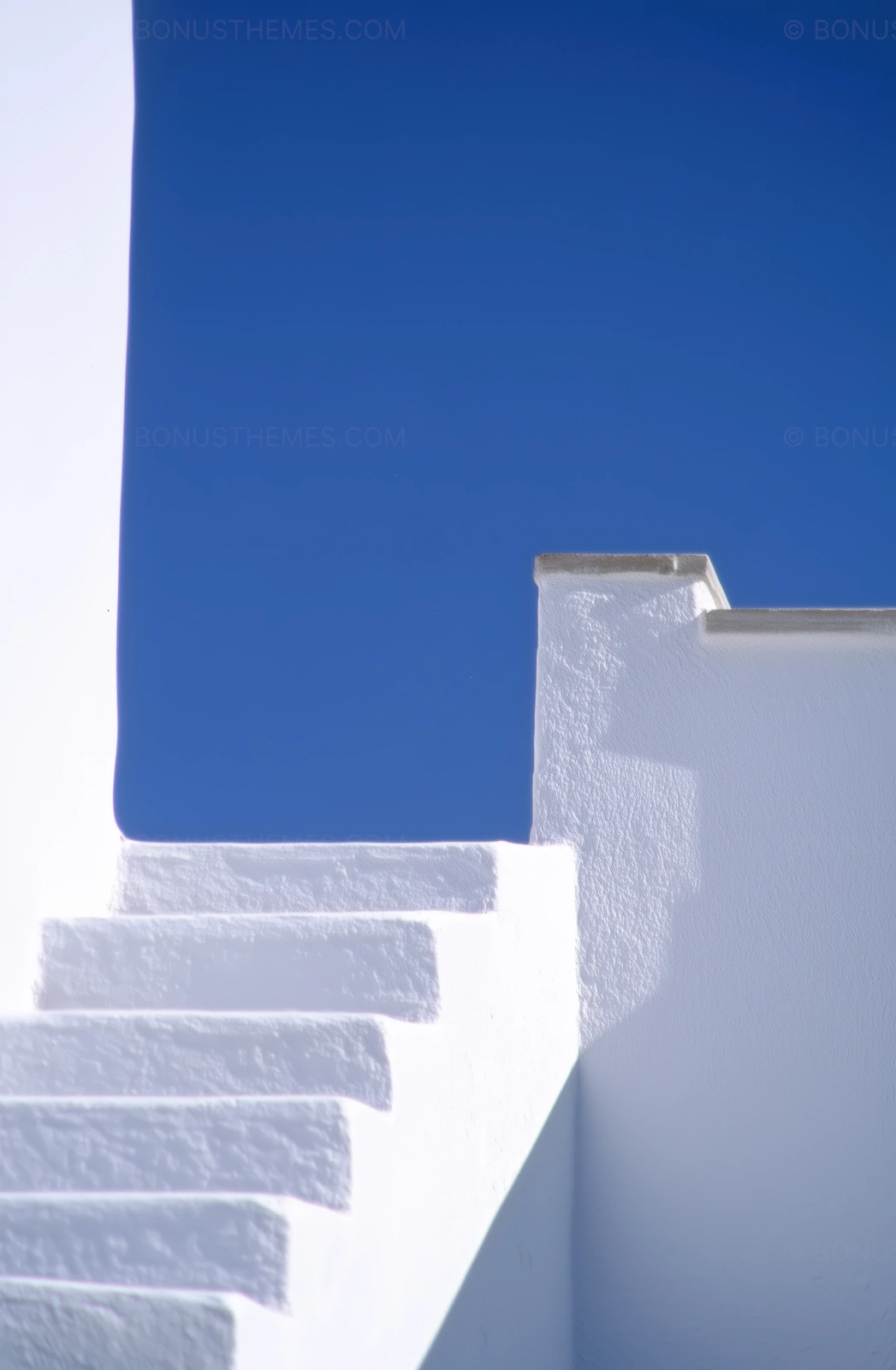 White Building with Staircase Under Blue Sky | Mediterranean AI Image